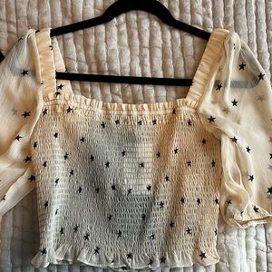 Cream star crop top